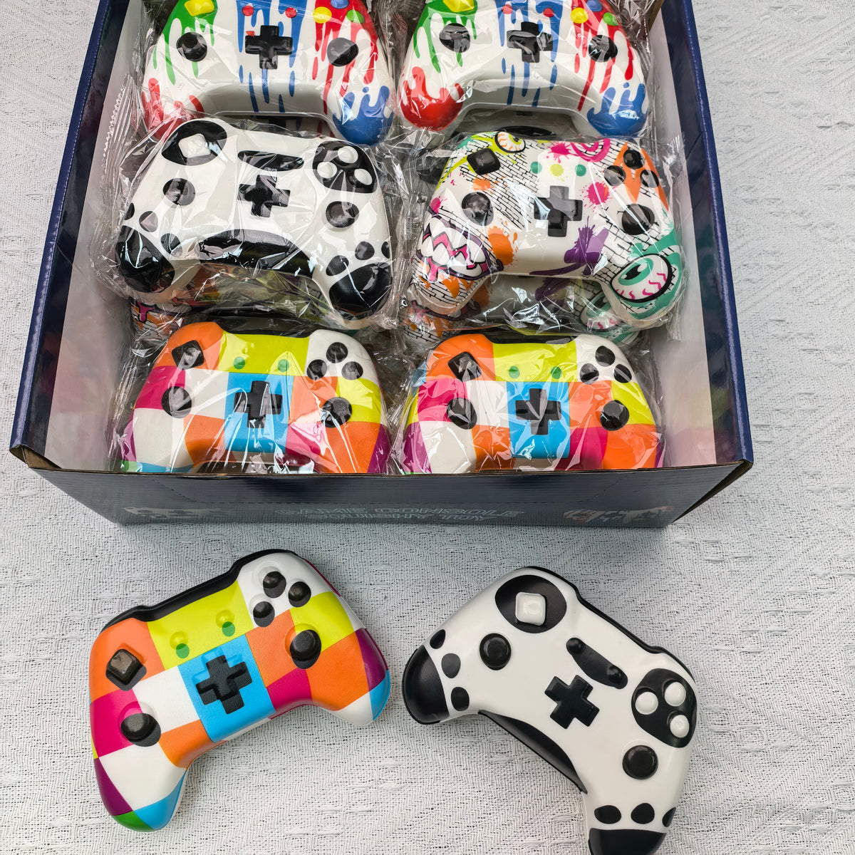 Assorted individually wrapped controller squishies