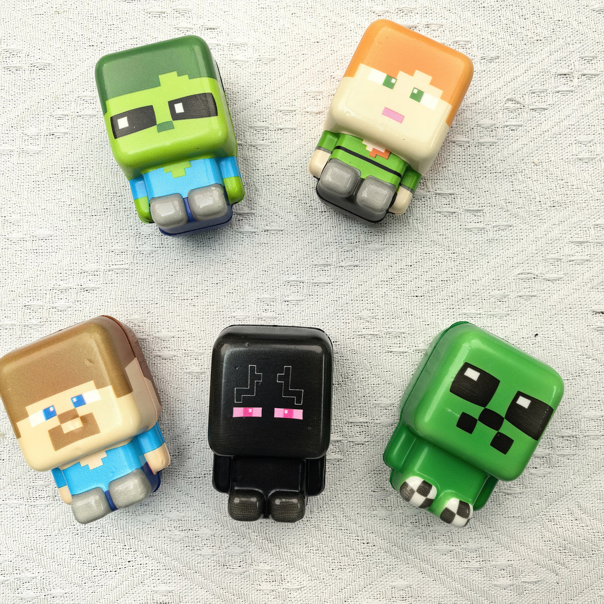 Minecraft-style five-piece PU squishy set. Detail or group view; decorative props are not included.