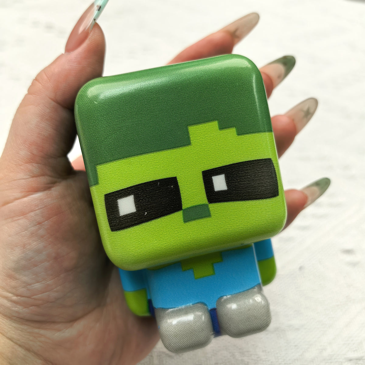 Minecraft-style five-piece PU squishy set. Detail or group view; decorative props are not included.