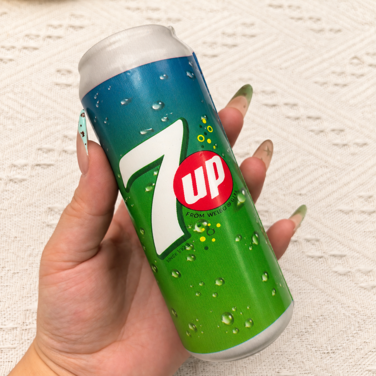 Soda can squishy product photo, warm natural lighting