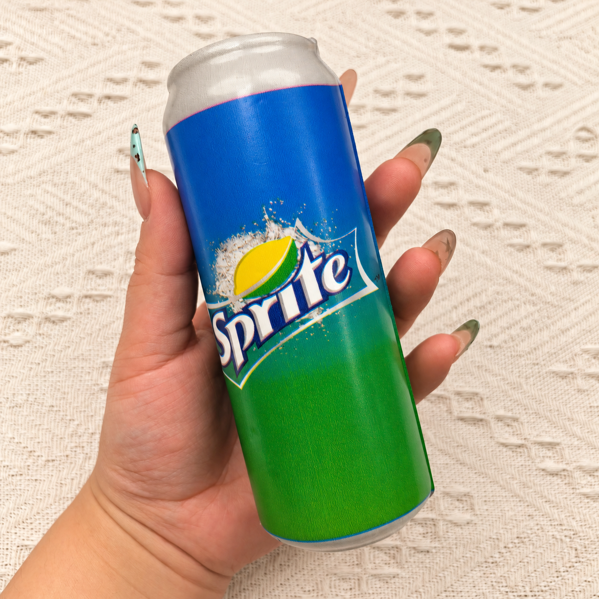 Soda can squishy product photo, warm natural lighting